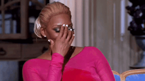 Woman In Pink Shirt Covering Face GIF