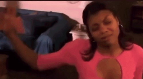 Woman in Pink Shirt Dancing