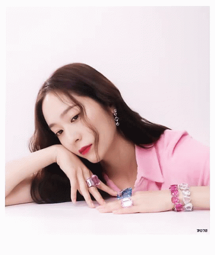 Woman in Pink Shirt Laying on Table