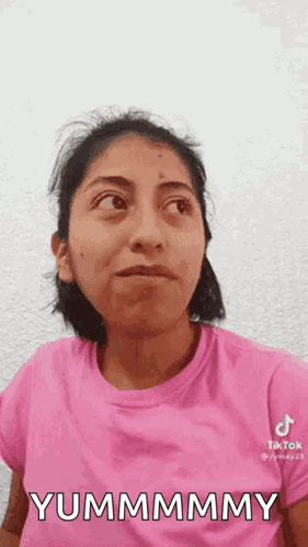 Woman In Pink Shirt Making Funny Face GIF