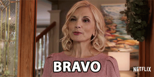 Woman In Pink Shirt Saying Bravo GIF
