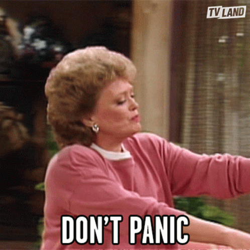Woman In Pink Shirt Says Don't Panic GIF