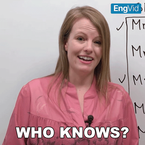 Woman In Pink Shirt Says Who Knows In Front Of Whiteboard GIF