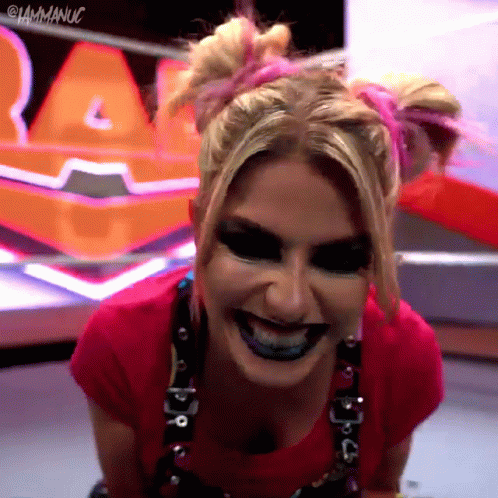 Woman In Pink Shirt Smiling With Black Lipstick GIF