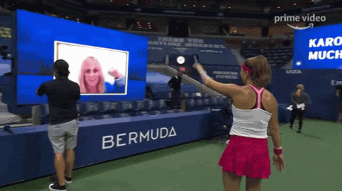 Woman in Pink Skirt in Front of Bermuda Banner