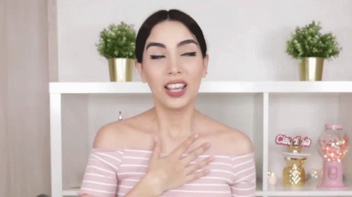 Woman in Pink Striped Shirt With Claudi