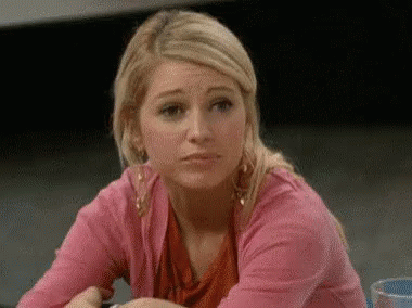 Woman in Pink Sweater Making Funny Face