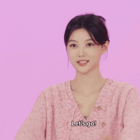 Woman in Pink Sweater Saying Let's Go