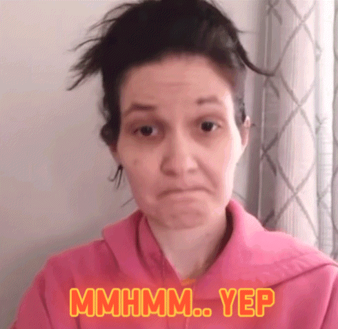 Woman In Pink Sweatshirt Making Funny Face GIF