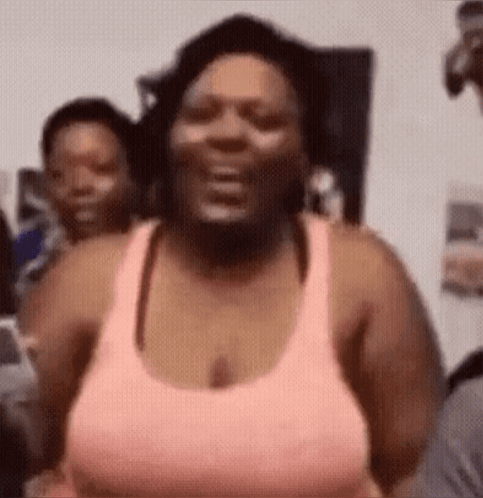 Woman in Pink Tank Top Laughing