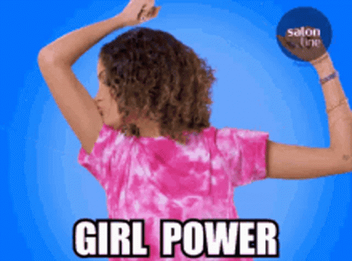Woman in Pink Tie Dye Shirt Flexing Girl Power