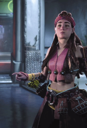 Woman in Pink Top and Red Headband Pointing