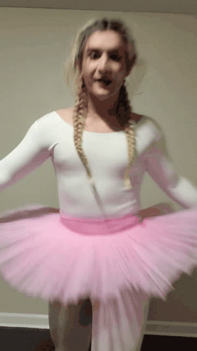 Woman in Pink Tutu and White Leotard