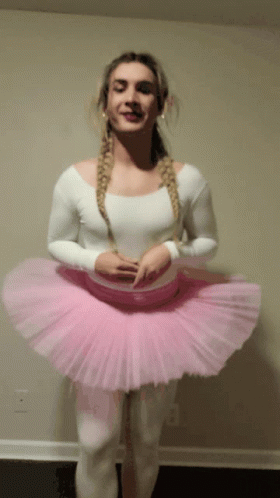 Woman in Pink Tutu and White Top