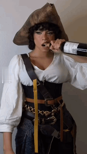 Woman in Pirate Costume Drinking Wine