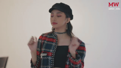 Woman in Plaid Jacket and MW Hat