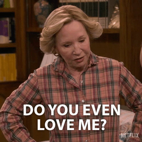 Woman in Plaid Shirt Asking Do You Love Me