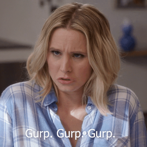Woman In Plaid Shirt Making Funny Face Saying Gurp Gurp Gurp GIF