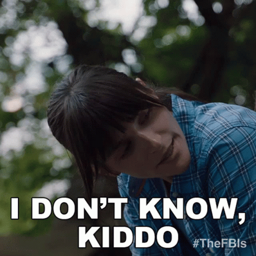 Woman in Plaid Shirt Says I Don't Know Kiddo