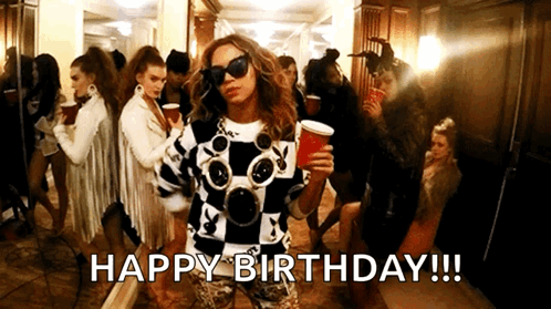 Woman in Playboy Sweater Holding Red Cup Says Happy Birthday