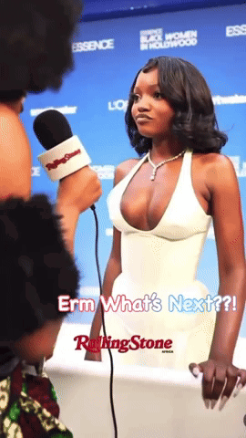Woman In Plunging White Dress Interviewed By Rolling Stone Reporter GIF