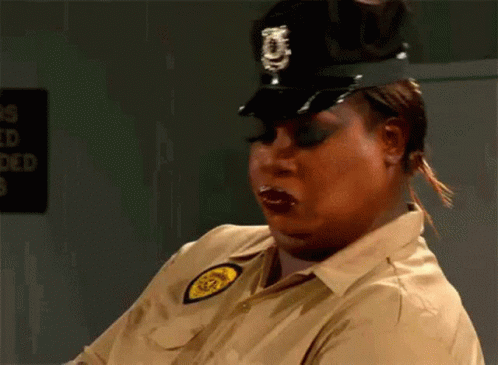 Woman in Police Uniform Making Funny Face