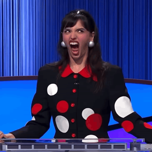 Woman In Polka Dot Jacket Making Funny Face GIF