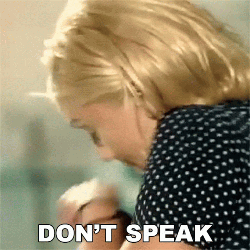 Woman in Polka Dot Shirt Says Don't Speak