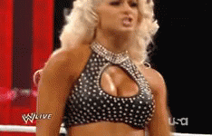 Woman in Polka Dot Top Standing in Ring