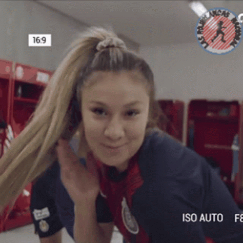 Woman in Ponytail Wearing Iso Auto Jersey