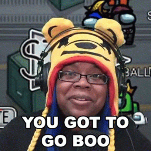Woman in Pooh Hat and Headphones Saying You Got to Go Boo