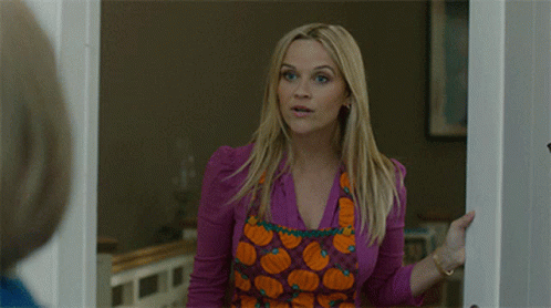 Woman In Pumpkin Apron Saying Oh GIF