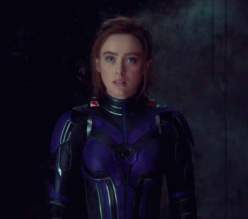 Woman in Purple and Black Superhero Costume