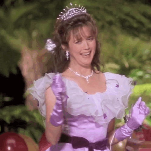 Woman in Purple Dress and Tiara