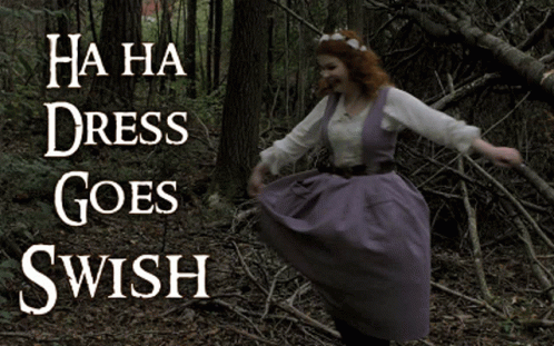Woman in Purple Dress Dancing in Woods Saying Ha Ha Dress Goes Swish