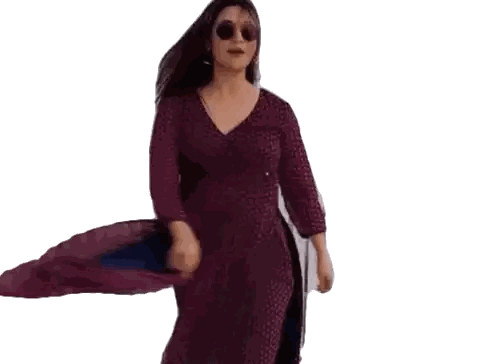 Woman in Purple Dress Dancing