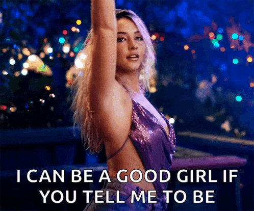 Woman in Purple Dress Saying I Can Be a Good Girl