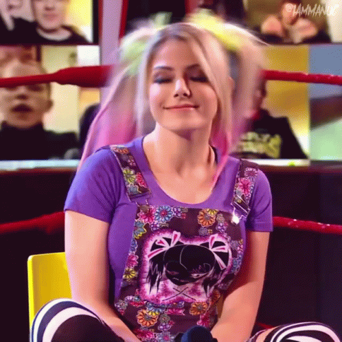 Woman in Purple Shirt and Overalls Sitting Eyes Closed