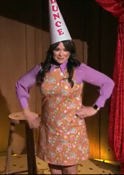 Woman in Purple Shirt and White Hat with Bounce