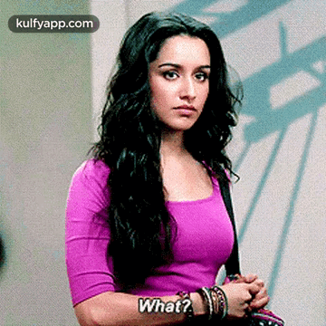 Woman in Purple Shirt Asking What