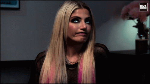 Woman In Purple Shirt Laughing In Front Of Diva Girls Logo GIF
