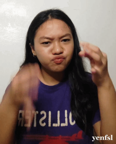 Woman in Purple Shirt Saying Yenfsl