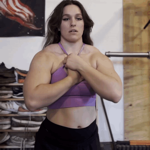 Woman in Purple Sports Bra in Front of American Flag