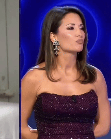 Woman in Purple Strapless Dress and Star Earrings