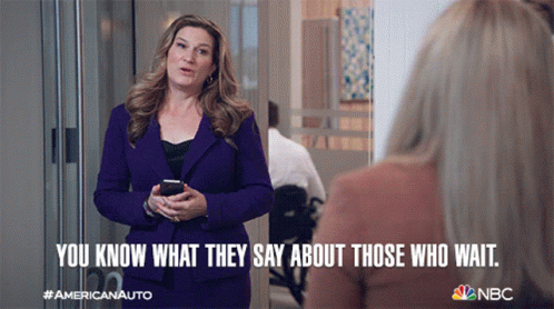 Woman in Purple Suit Saying You Know What They Say