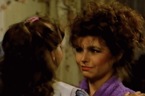 Woman In Purple Sweater Stirring Soup GIF