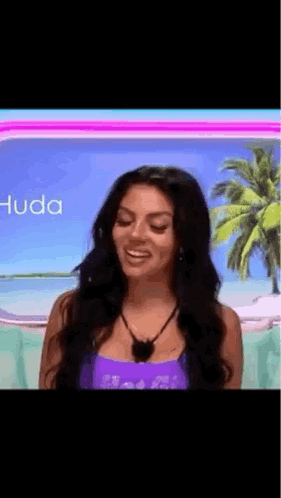 Woman in Purple Tank Top Smiling