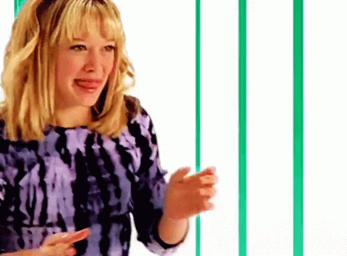 Woman in Purple Tie Dye Dress with Green White Striped Wall