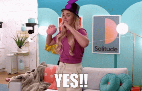 Woman In Purple Top Hat Says Yes GIF
