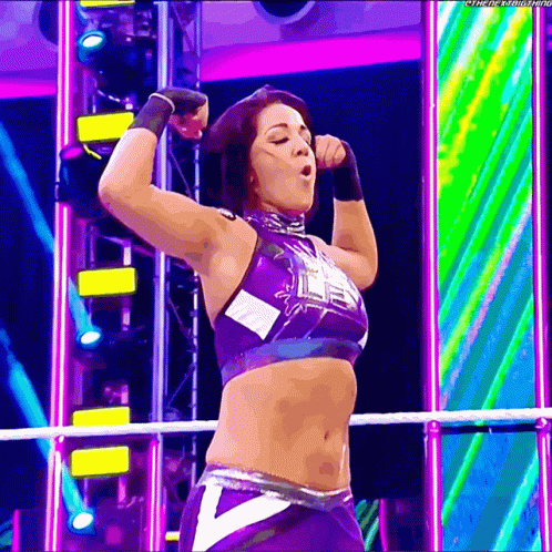 Woman in Purple Top With Letter V Dancing